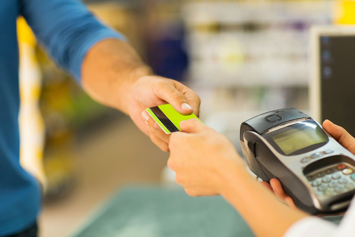 Person Making Credit Card Transaction