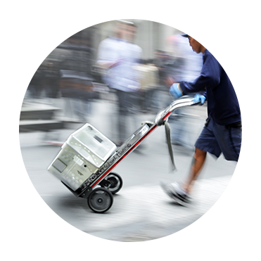 Mailman Pushing Mail on Hand Truck