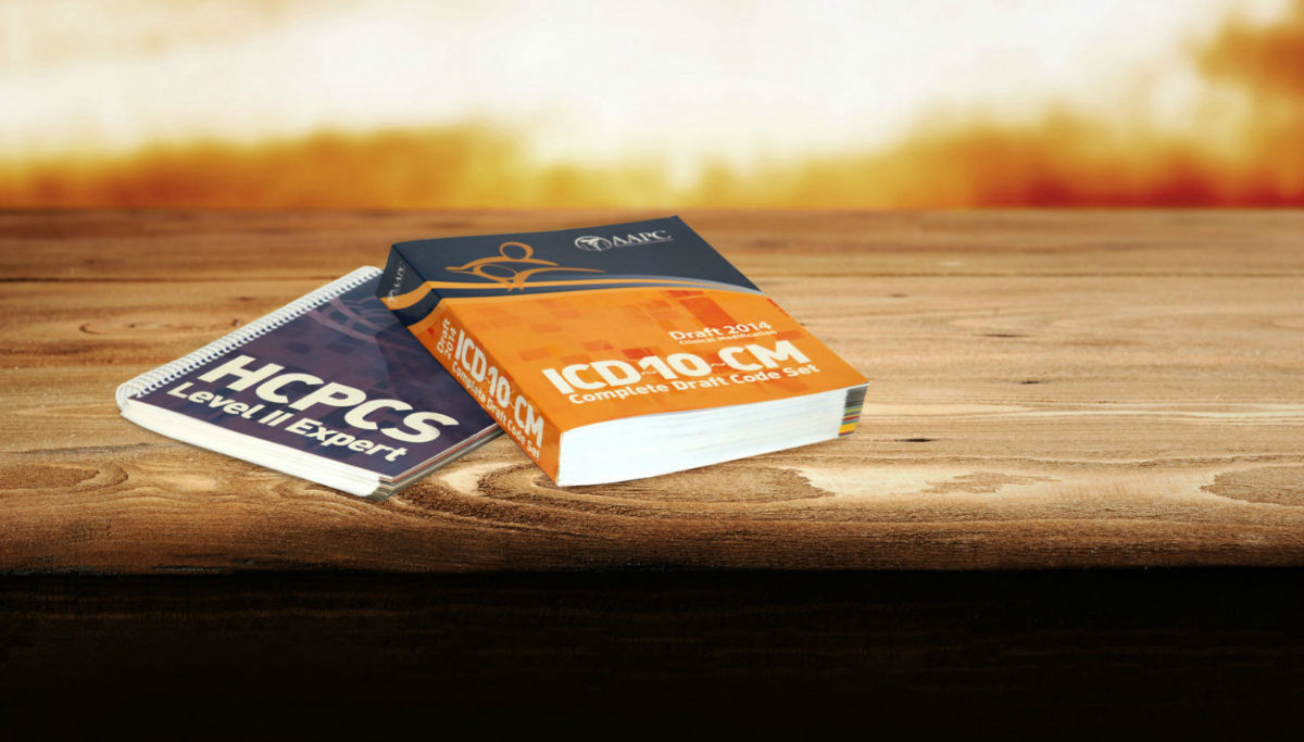 ICD-10 Books Laying on Table